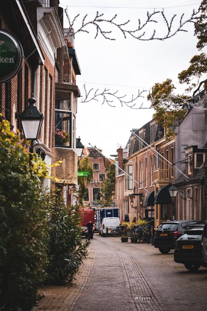 A street with cars parked on both sides of it